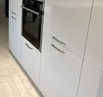 White drawers with black oven