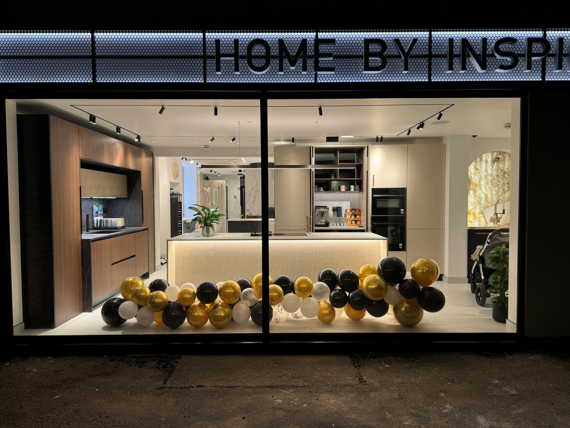 Modern minimalist sink with terrazzo backsplash and matte black faucet